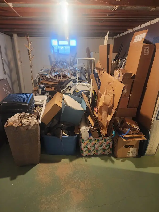 Roll-off dumpster container at job site for 4 Yard Dumpster Rental in Rockford